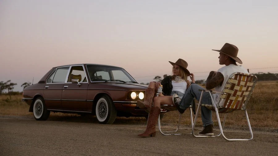 Friends gathering outdoors during a countryside escape